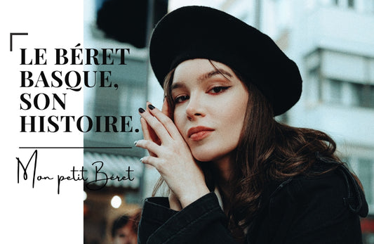 jolie jeune femme portant un béret basque noir, du vernis noir et du rouge à lèvres rouge